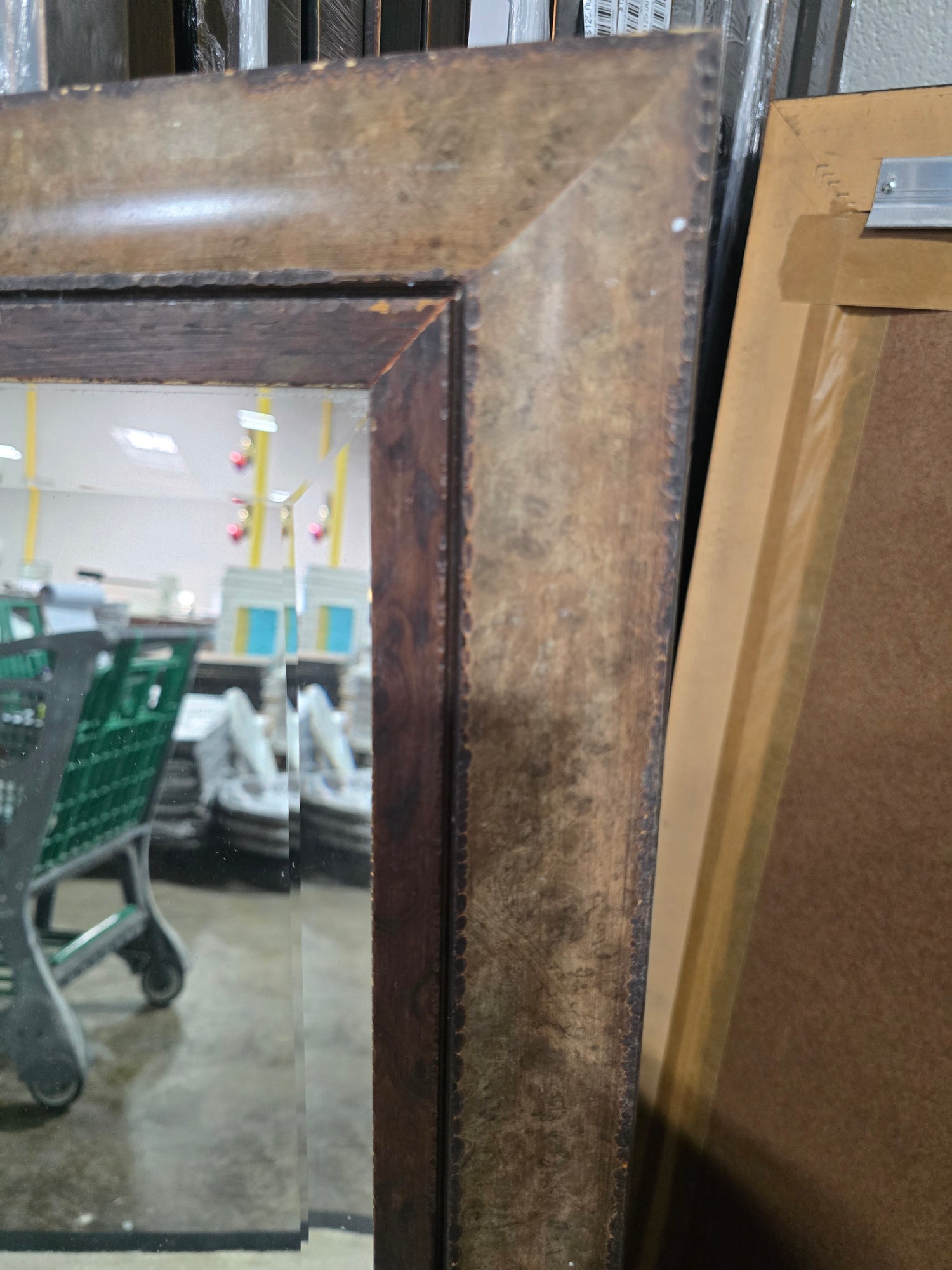 Vertical wall mirror with tan and brown finish 30 x 49