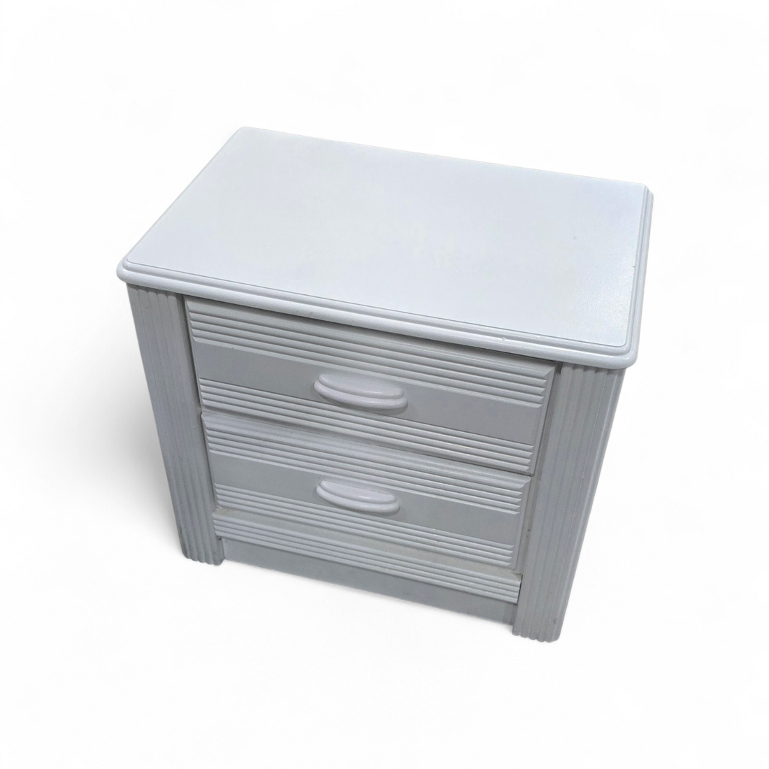 SHL angled view of white reeded nightstand for bedside storage, used and in good condition