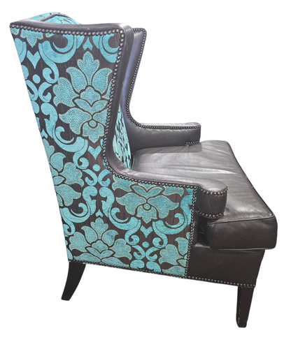 Side angle view of traditional wingback accent chair