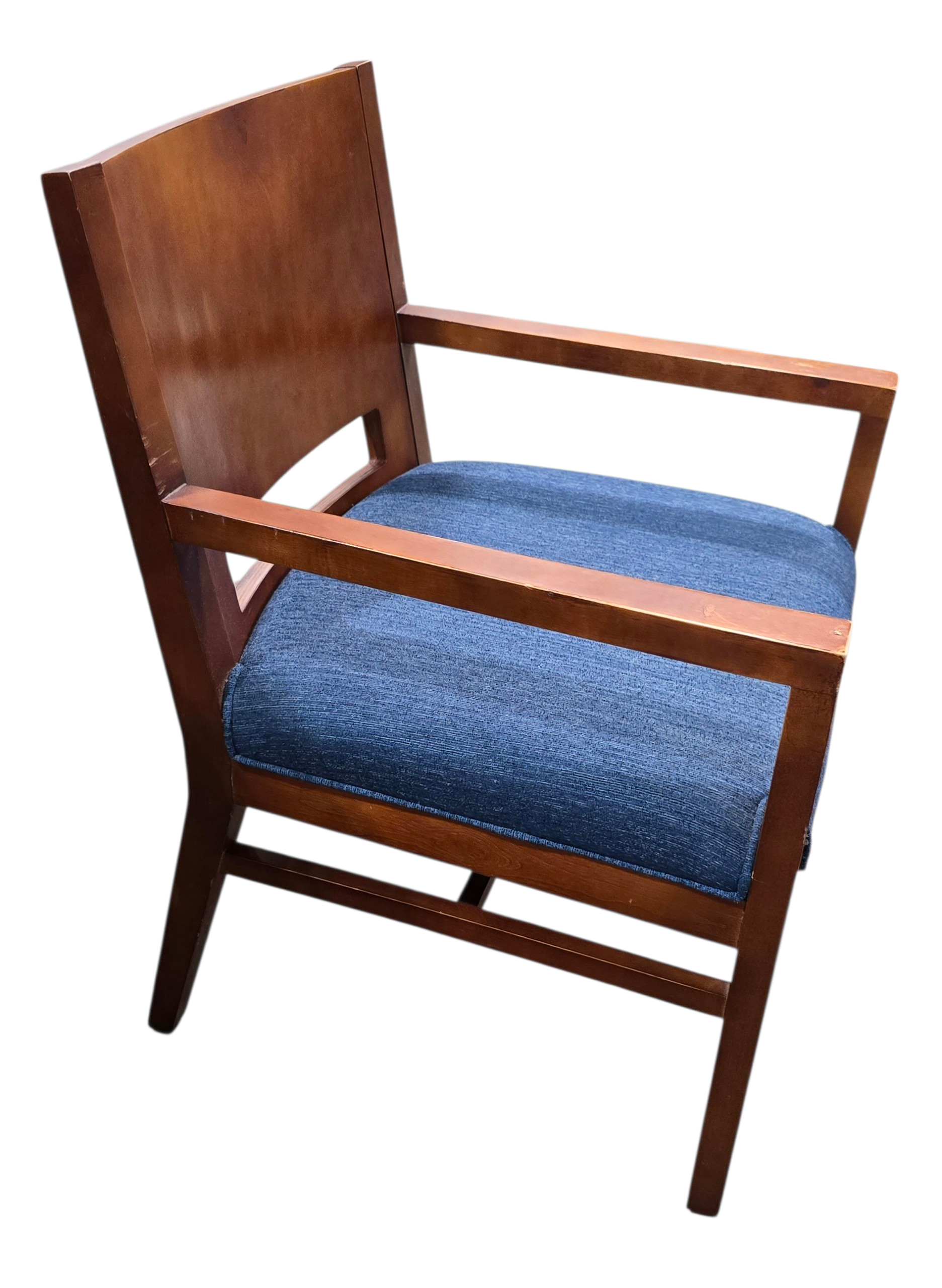 Side angle view of wood dining chair with upholstered seat