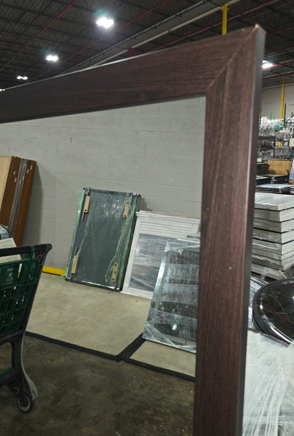 SHL dark brown full length wall mirror measuring 24 x 60 inches shown from angled view