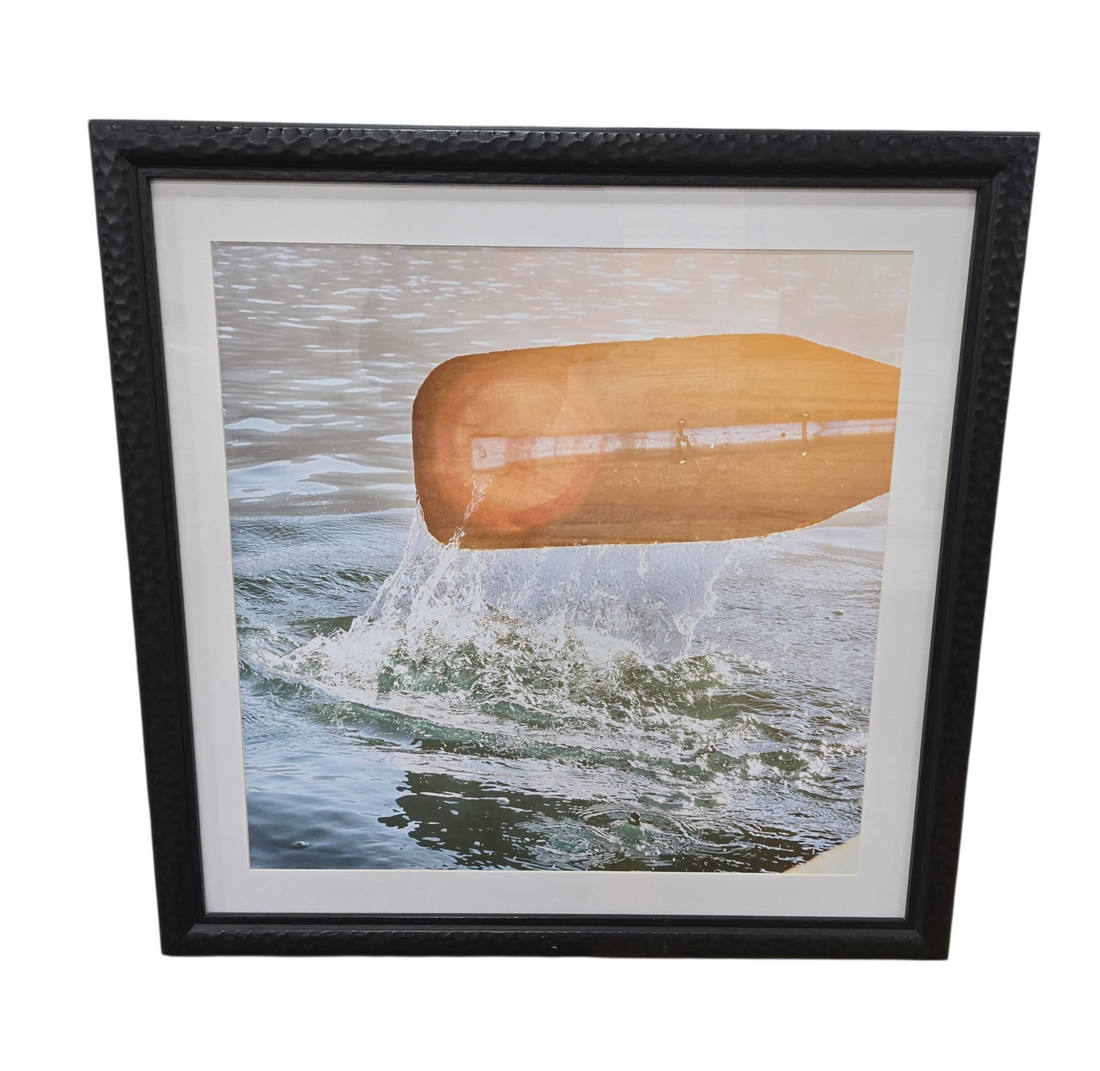 SHL framed canoe paddle coastal wall art with textured black frame and white mat border measuring 30 x 30 used in good condition