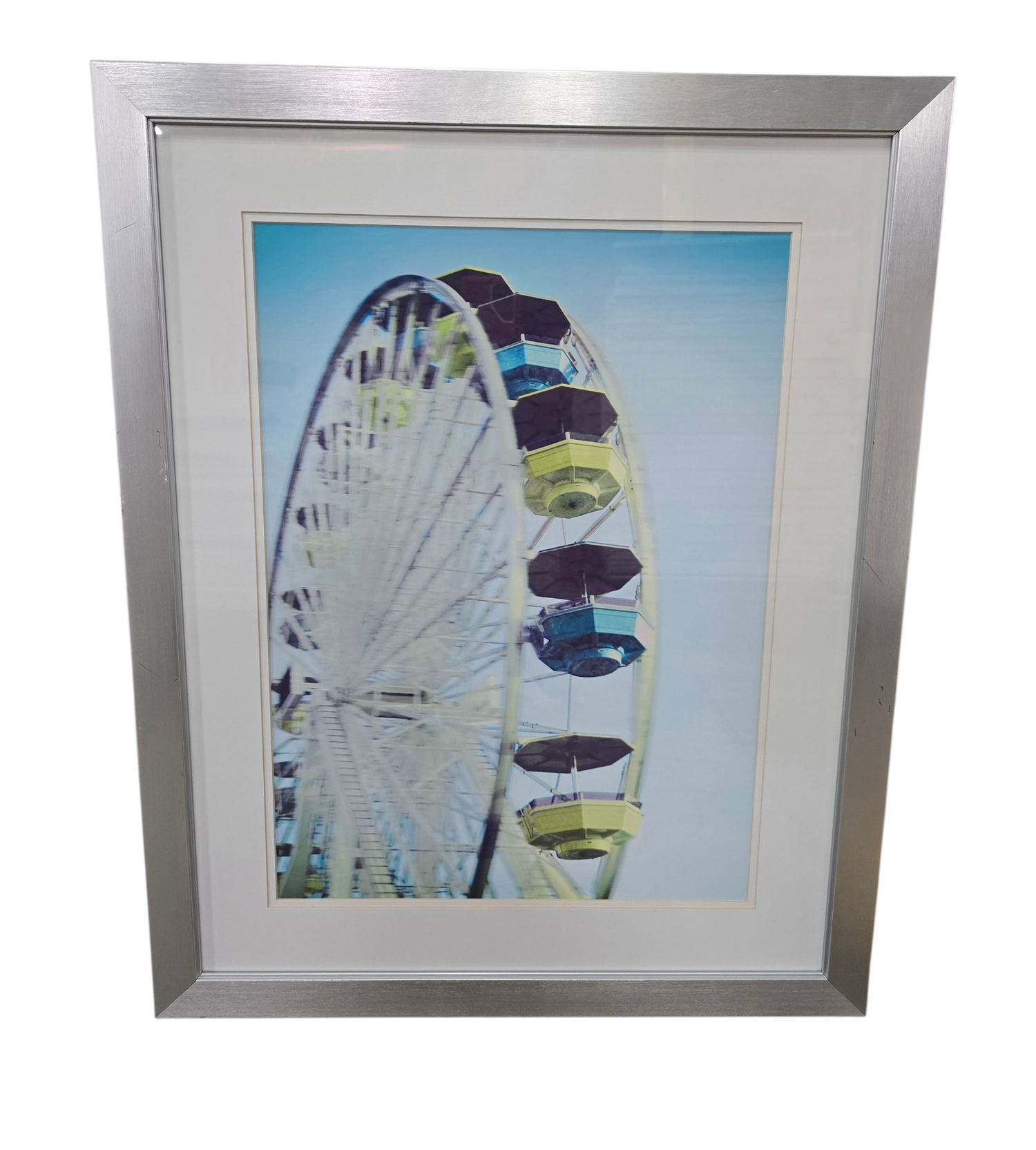 SHL framed Ferris wheel photography wall art with silver frame and pastel coastal style measuring 23 3/4 x 29 3/4 used in good condition