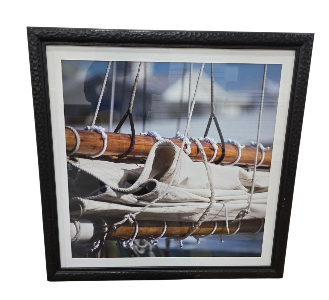 SHL framed nautical sailboat wall art featuring sailboat rigging and canvas sails with textured black frame measuring 30 x 30 used in good condition