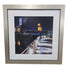 SHL framed nighttime waterfront cityscape wall art featuring illuminated boardwalk and harbor bridge scene measuring 27.5 x 27.5 used in good condition