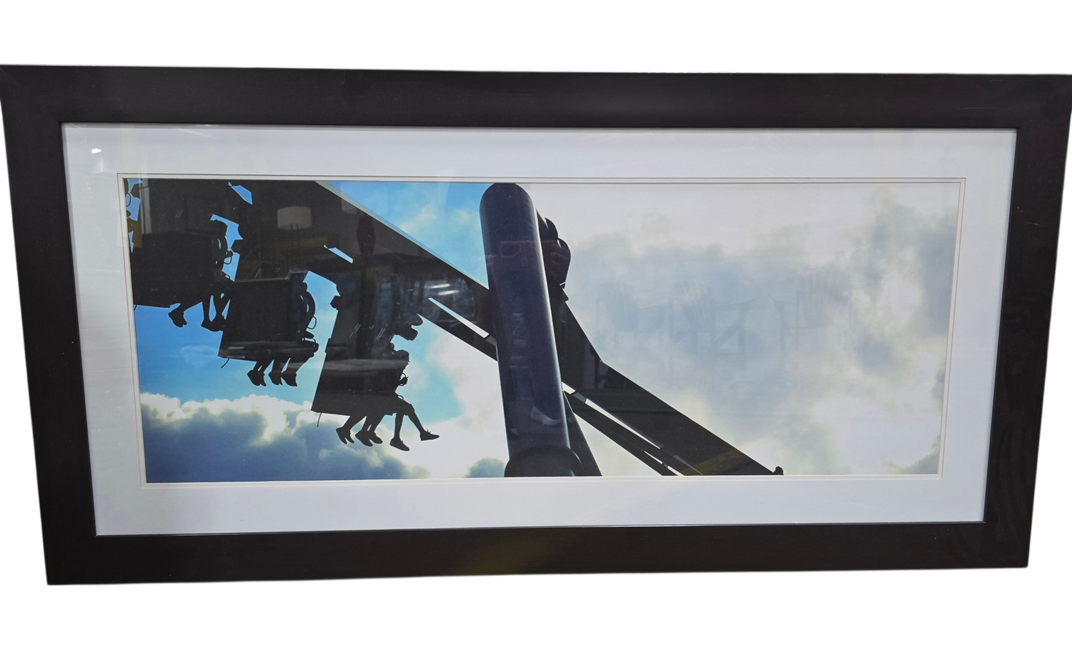 SHL framed panoramic roller coaster photography wall art with dark frame and white mat border measuring 59.5 x 29.5 used in good condition