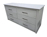 SHL white six drawer dresser measuring 60 x 19.5 x 30 inches shown from angled view with decorative drawer detailing