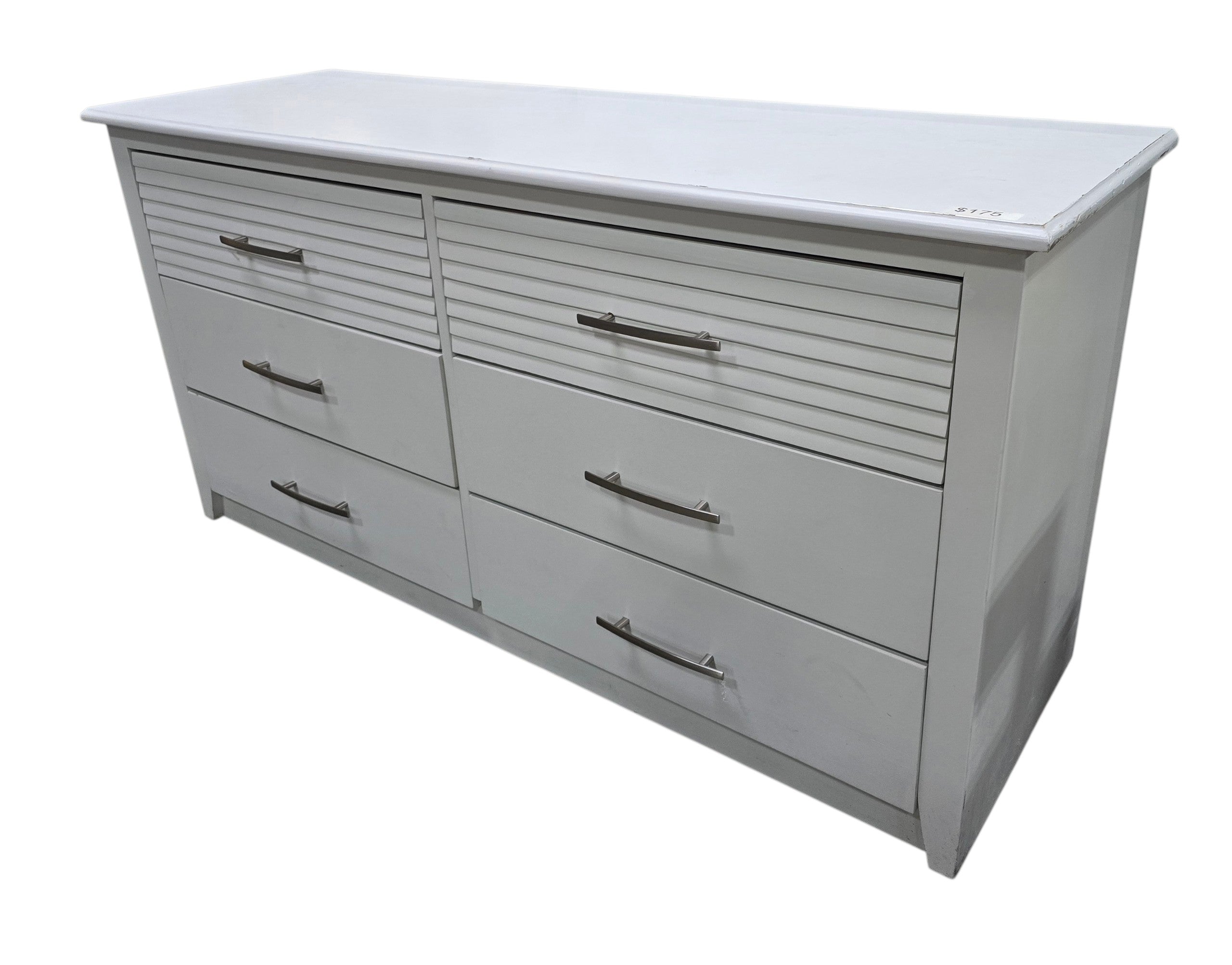 SHL white six drawer dresser measuring 60 x 19.5 x 30 inches shown from angled view with decorative drawer detailing