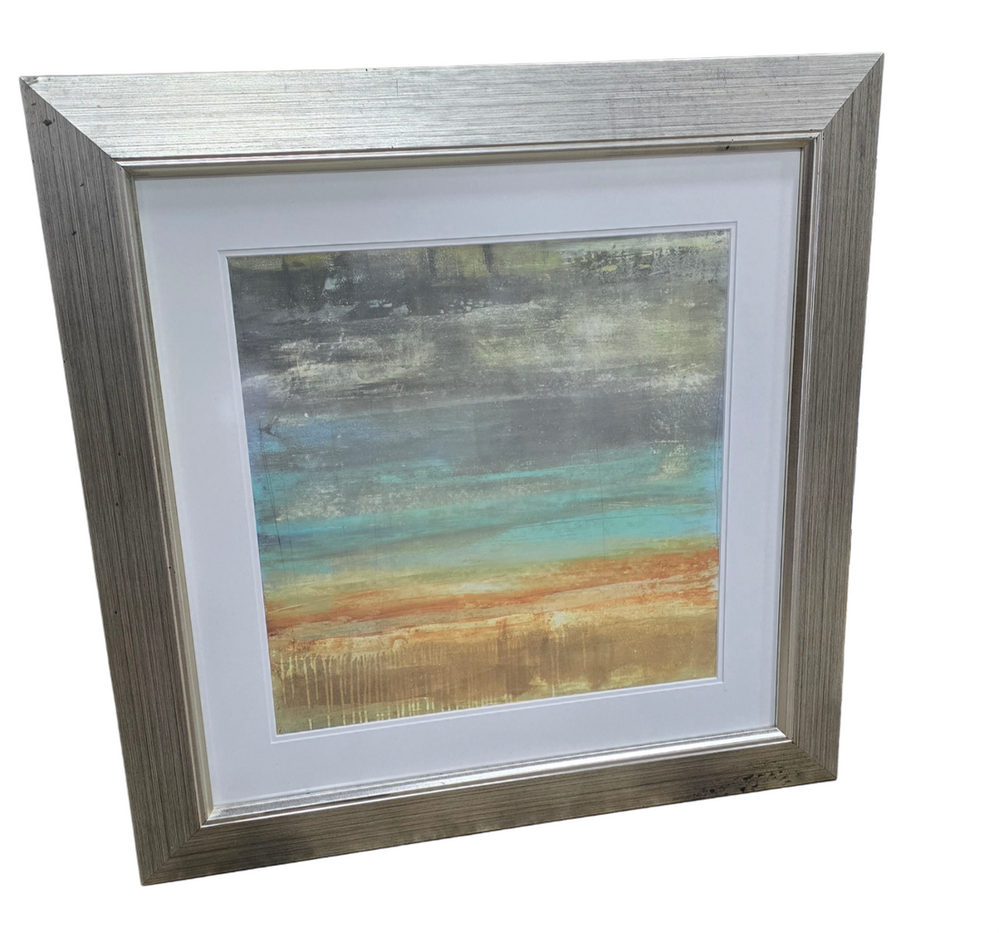 Front view of 33 x 33 abstract wall art with silver frame. Modern artwork for homes, rentals, or hotel interiors.