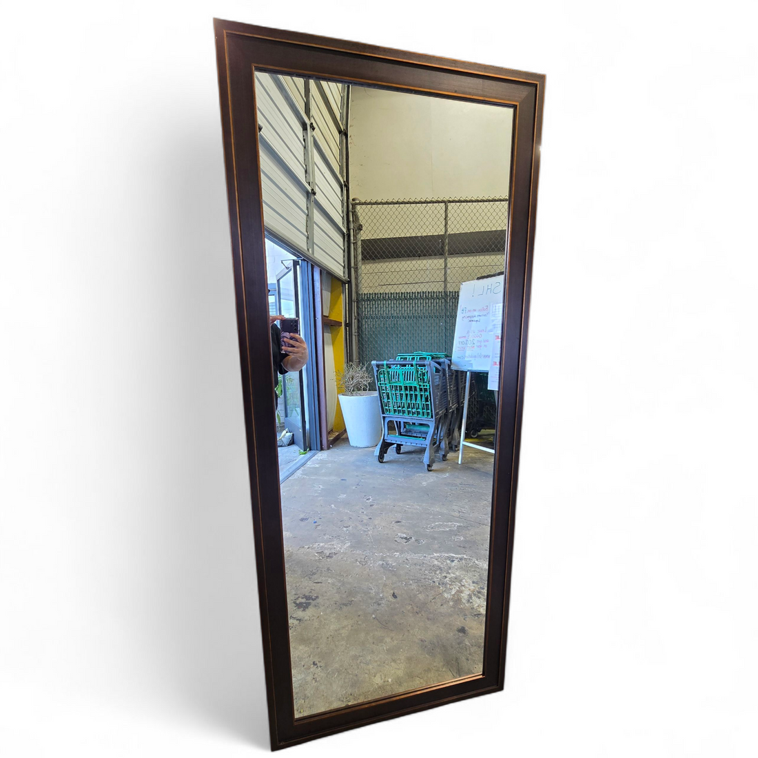 Brown framed full-length dressing mirror, 29 3/4 by 71 3/4 inches, used and in good condition, sourced from upscale resort