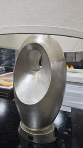 Brushed silver tone lamp with modern design, available at Southern Hospitality Liquidation in Cartersville GA