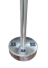 Hotel-style metal candlestick lamp with two built-in outlets, SHL Cartersville GA.