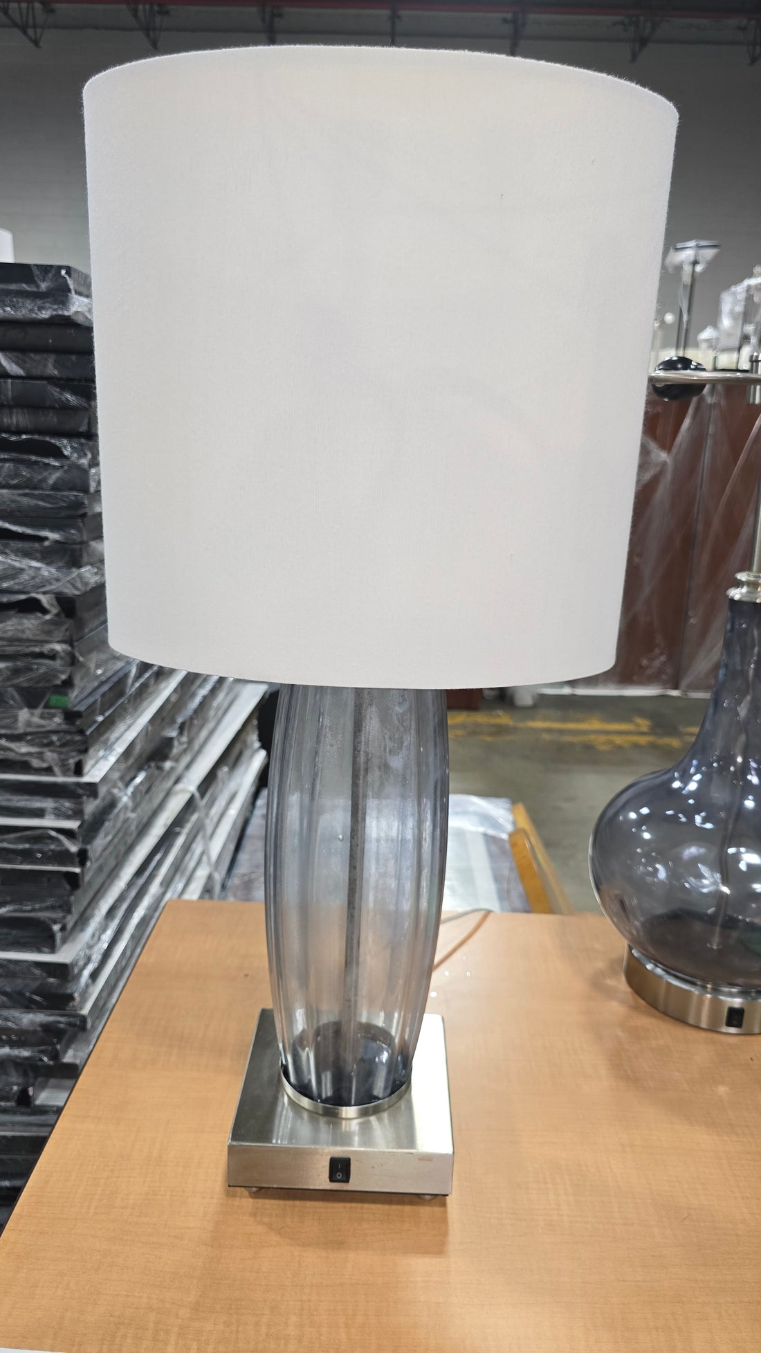 Elegant blue glass lamp in great condition, perfect for coastal or modern décor, used