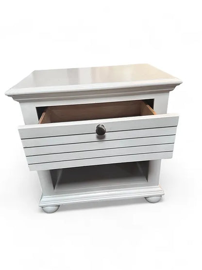 “Used white nightstand with shutter-front design, coastal farmhouse look, $65 each, gently used”