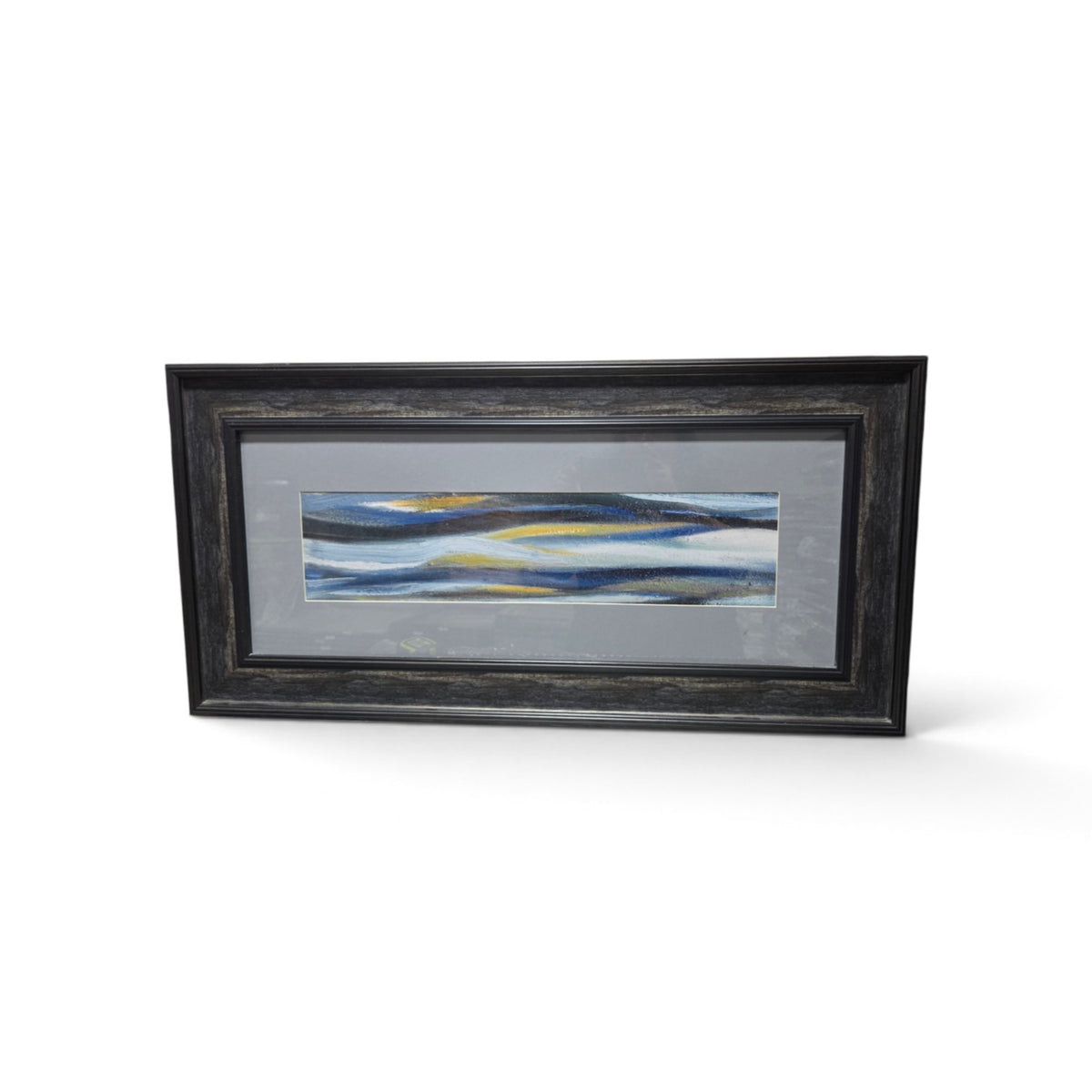Framed abstract coastal artwork with blue gray white and gold wave-like design