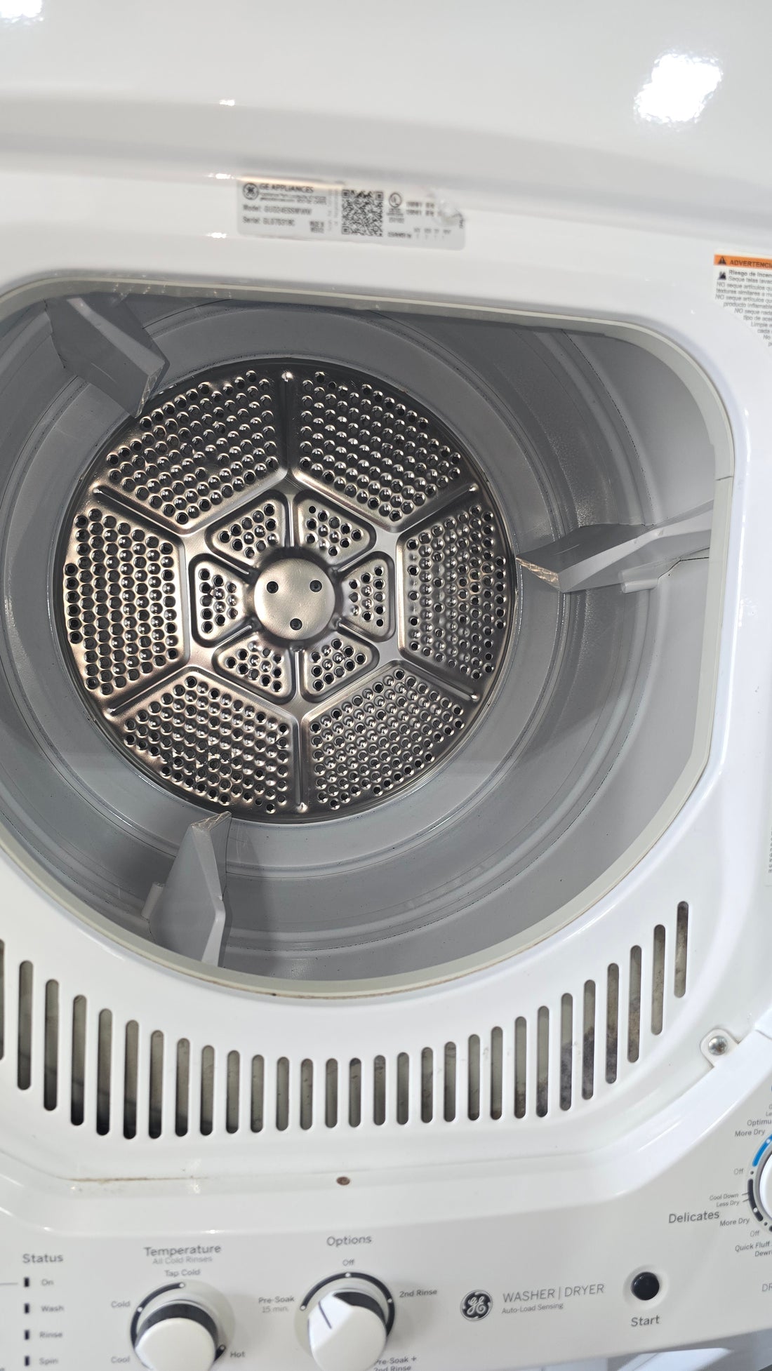 GE Spacemaker 24-inch laundry center, 2018 model, used and in good condition from resort