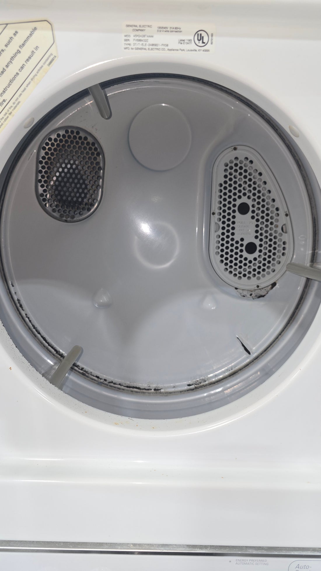 GE Spacemaker 24-inch stacked laundry center, used and in good condition from resort