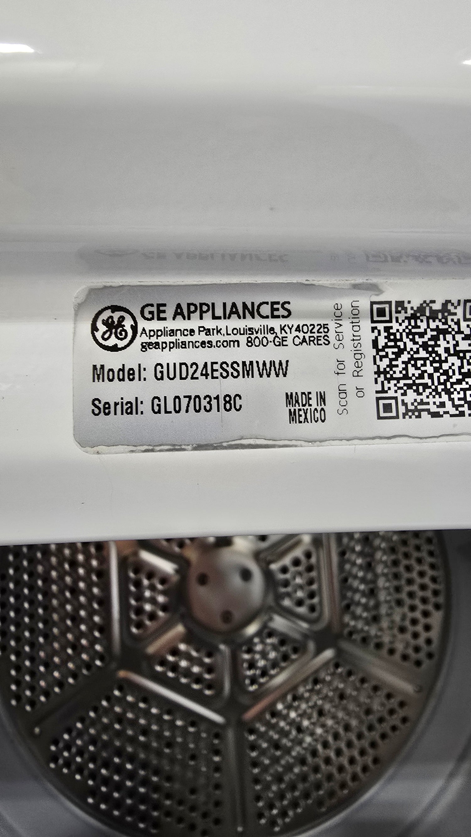 White 2018 GE Spacemaker washer and dryer, space-saving stacked design, used and in good condition