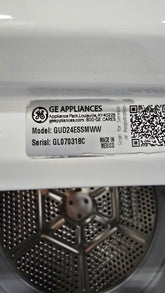 White 2018 GE Spacemaker washer and dryer, space-saving stacked design, used and in good condition
