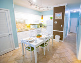 Grand Palms dining set – table with chairs and additional artwork from Myrtle Beach hotel furniture liquidation