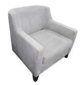 Modern upholstered gray accent chair with arms, perfect for living rooms, rentals, or hotel interiors