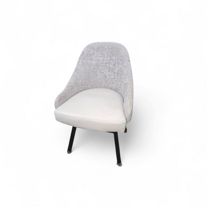 Front view of gray swivel dining chair used from SHL in good condition