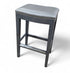 Gray upholstered barstool from SHL hotel liquidation