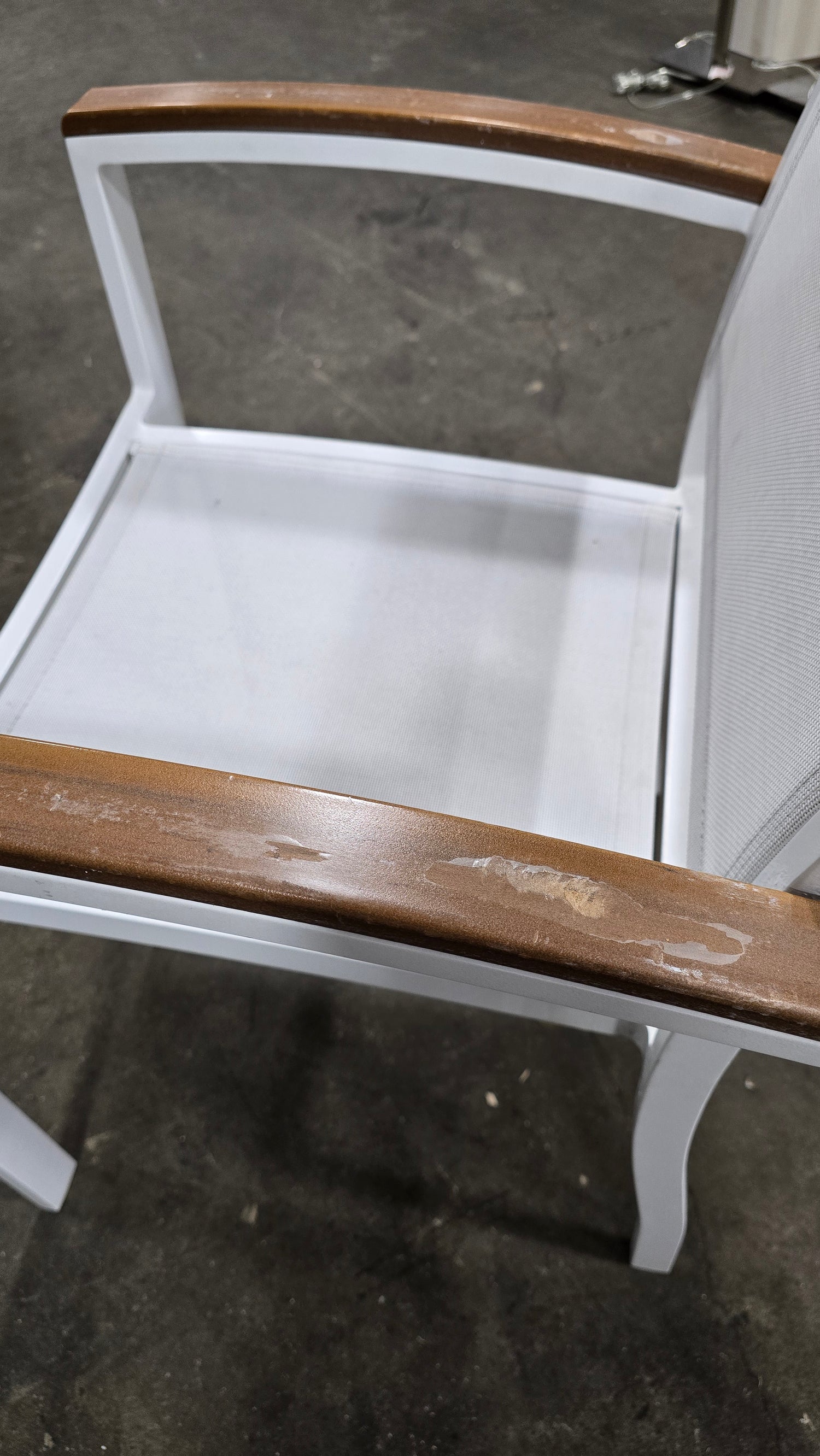 Hotel patio chair by Janus, white finish, 22.25W x 18.75D with 17.5 seat height, available from SHL Cartersville GA