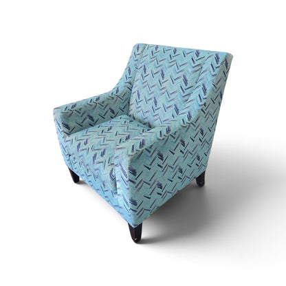 Side view of Kellex aqua blue and navy geometric upholstered armchair