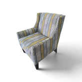 Side view of Kellex gray yellow and cream geometric upholstered armchair