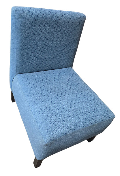 Modern blue slipper chair with black wooden legs, hotel liquidation furniture from SHL Cartersville GA