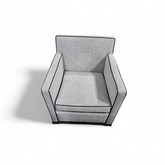 “Modern gray arm chair with black trim – used in good condition, perfect for living or office space”