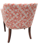 Back view of orange and beige bucket chair, modern resort-style seating, SHL furniture