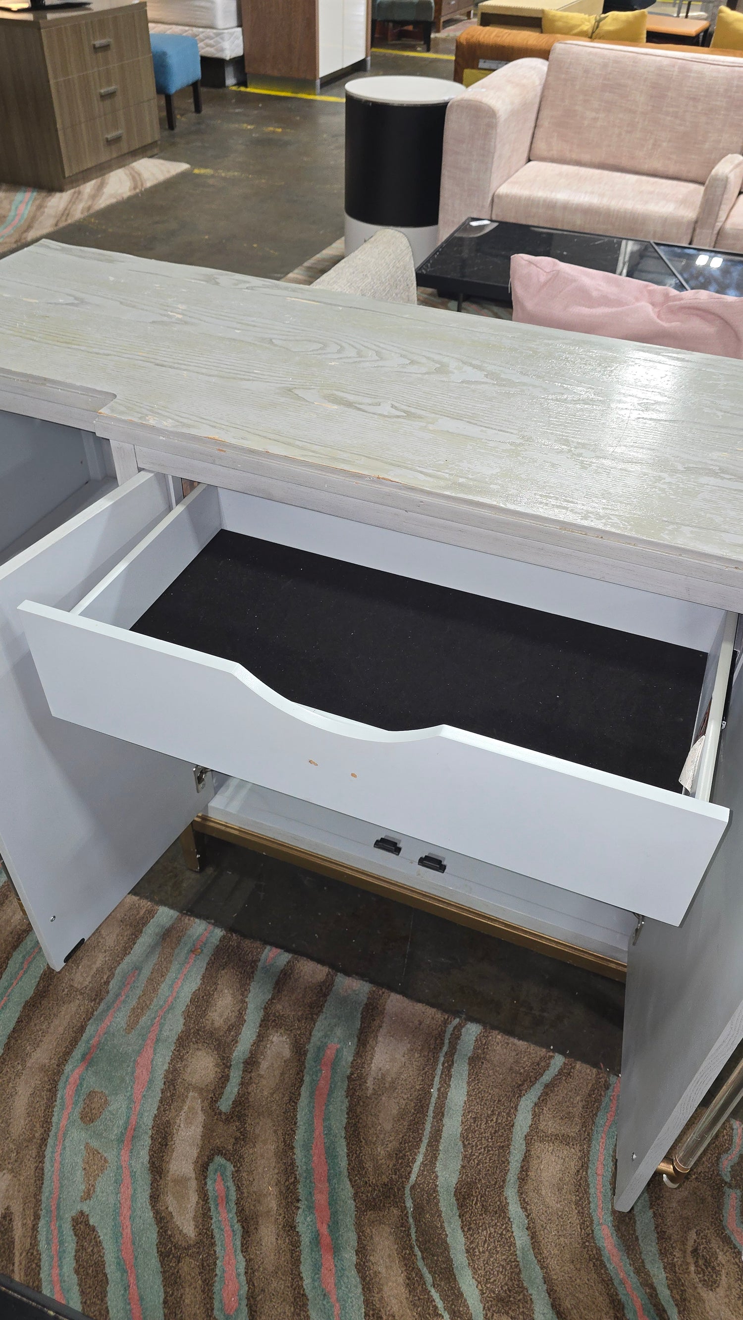 Pre-owned modern light blue buffet with gold accents from hotel liquidation, available at SHL Cartersville GA