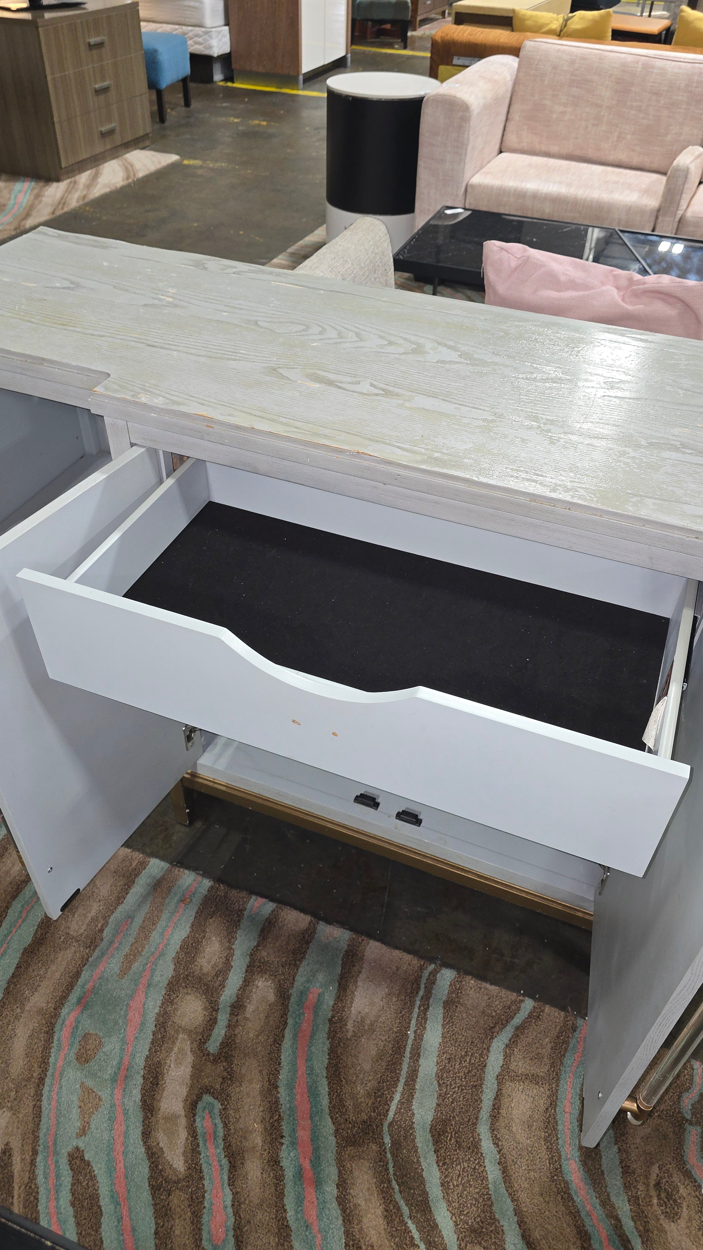 Pre-owned modern light blue buffet with gold accents from hotel liquidation, available at SHL Cartersville GA