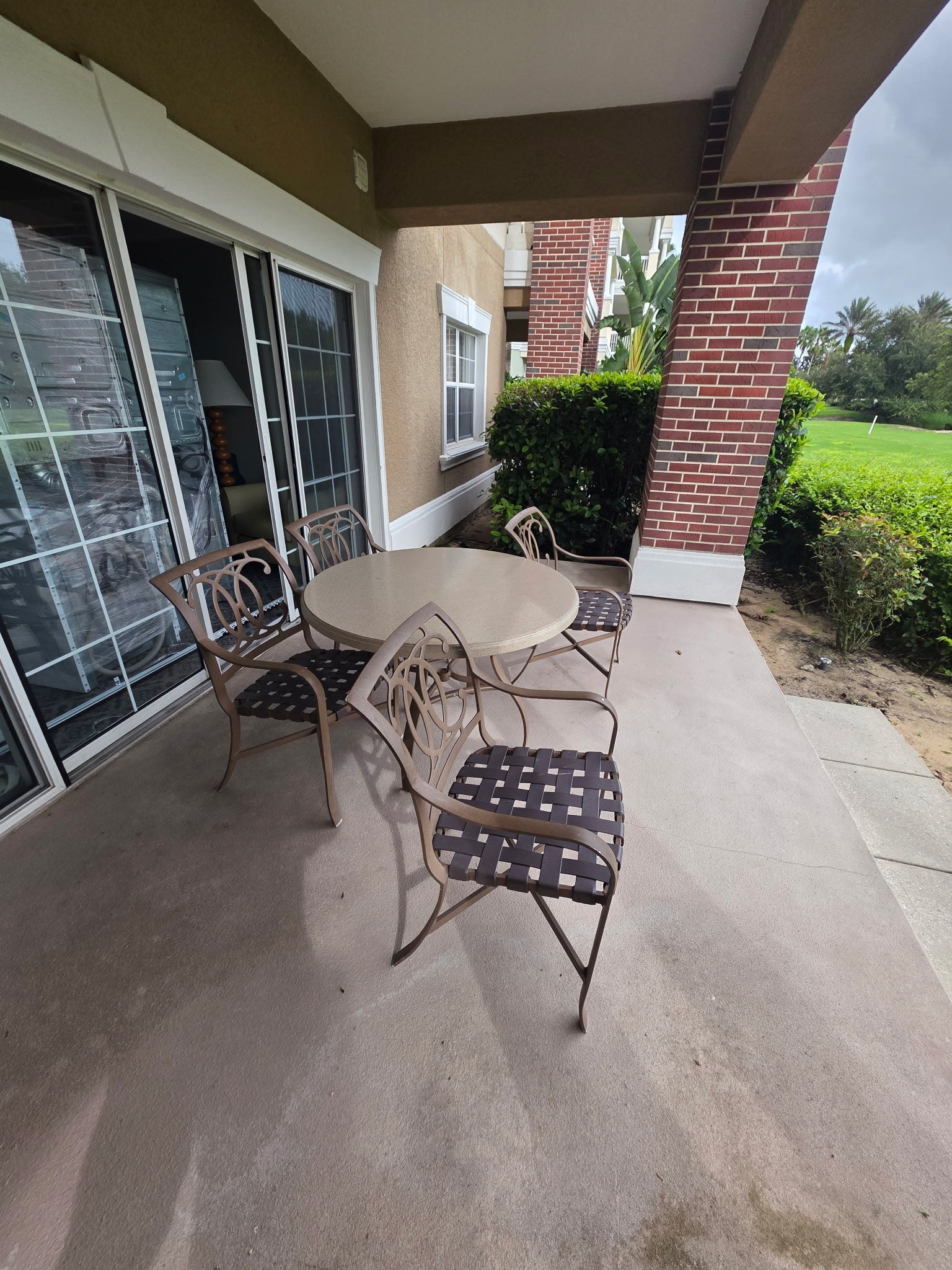 Outdoor furniture liquidation from Reunion Resort Kissimmee FL including lounge chairs, dining set and tea table