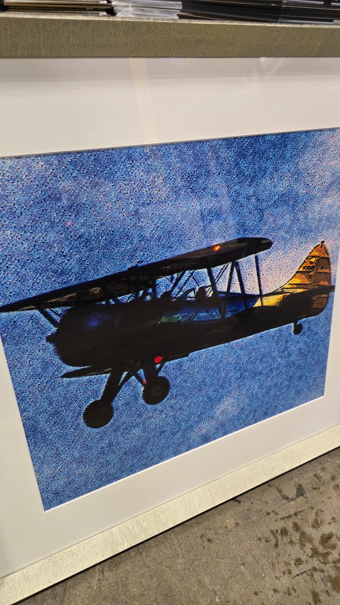 Affordable aviation wall art – biplane artwork 25.5x24 with silver frame Cartersville GA