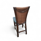 SHL back view of cane bar stool with dark green padded cushion, used and in good condition