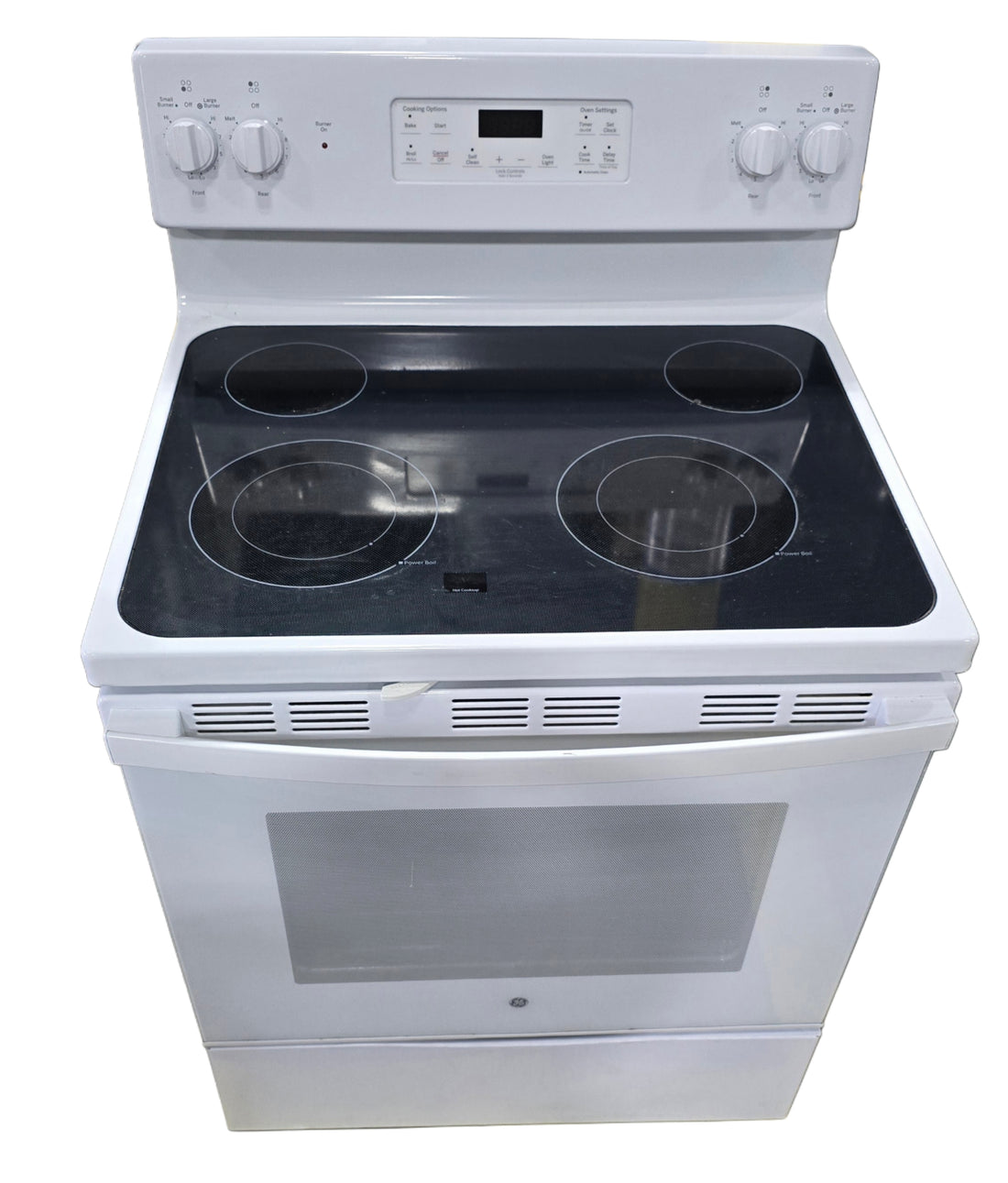 Smooth glass cooktop surface on GE 30-inch electric stove from Southern Hospitality Liquidation