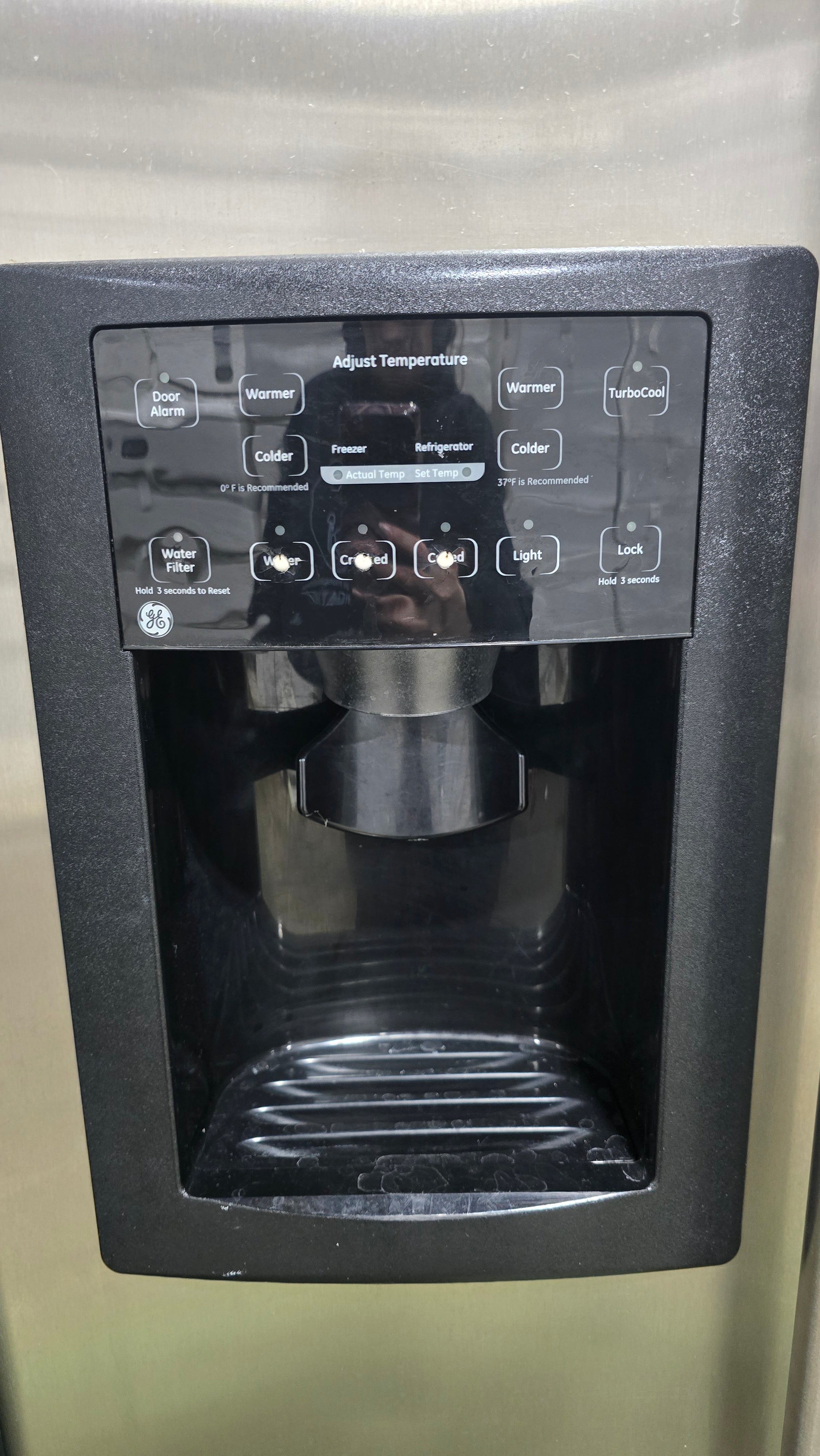 SHL handle detail of GE side-by-side refrigerator/freezer, used and in good condition