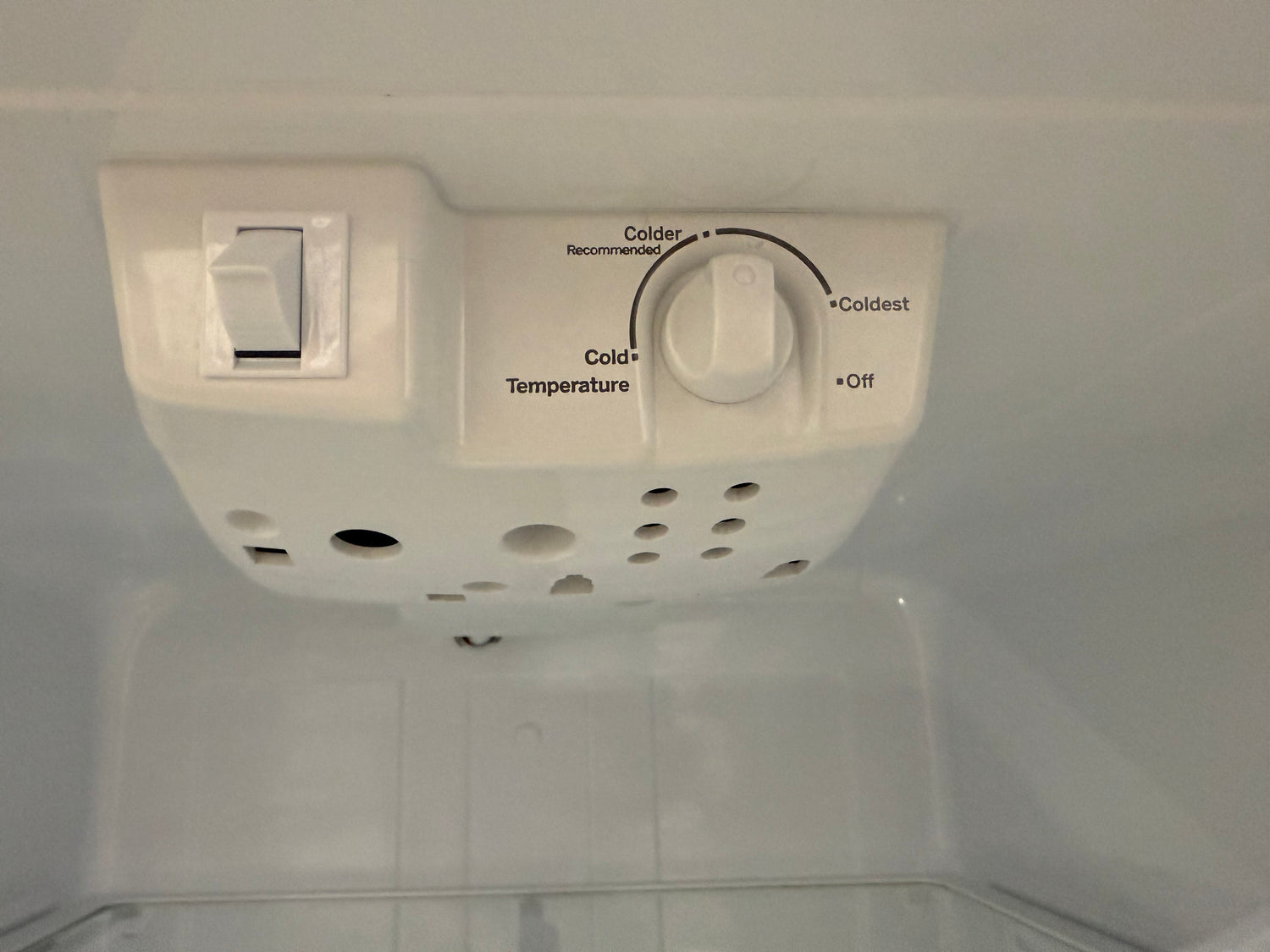 GE top freezer refrigerator door with storage bins and compartments from Southern Hospitality Liquidation