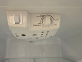 GE top freezer refrigerator door with storage bins and compartments from Southern Hospitality Liquidation