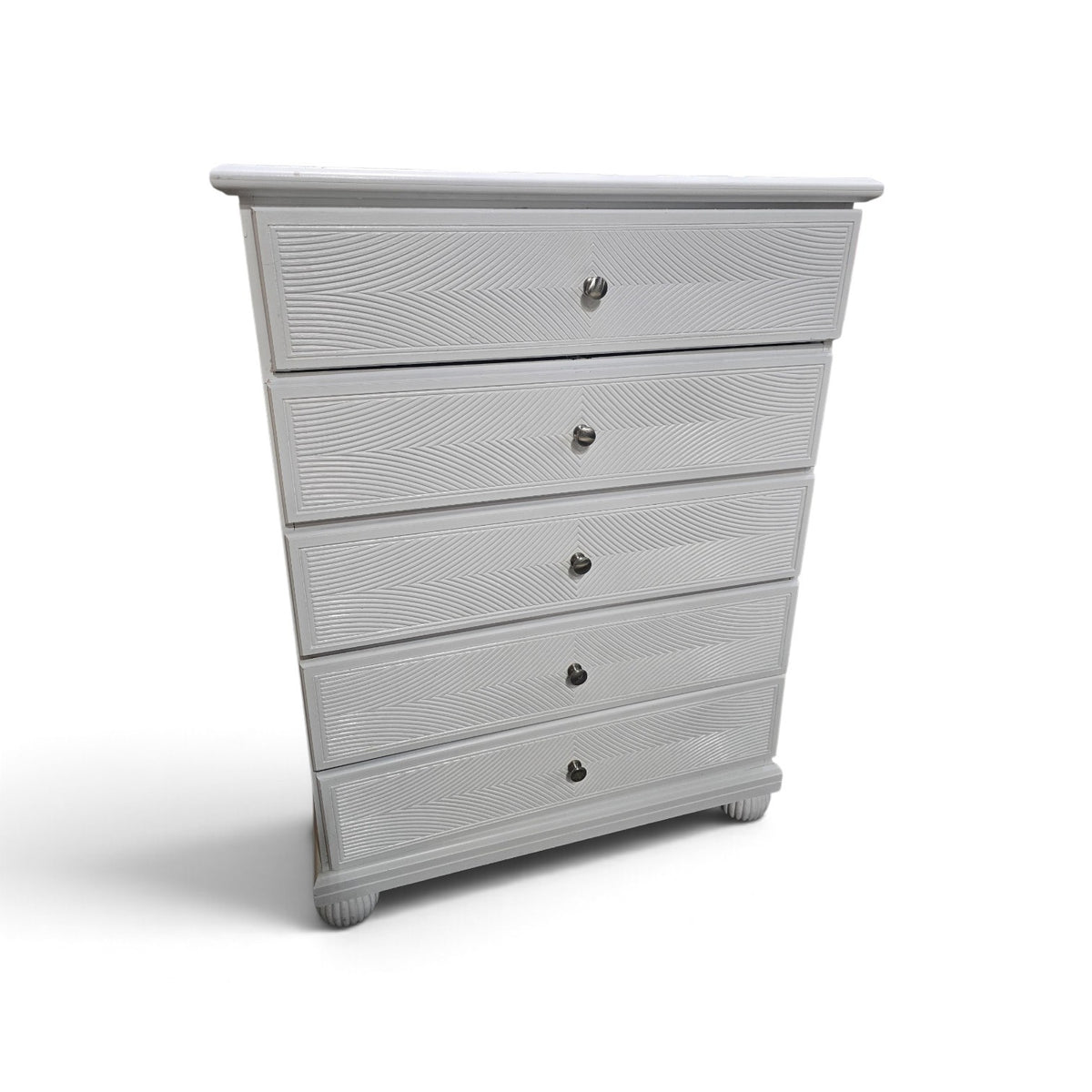 Used white five-drawer chest with decorative wave-pattern fronts, SHL.