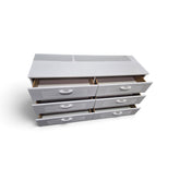 Used white six-drawer dresser with drawers open, SHL.