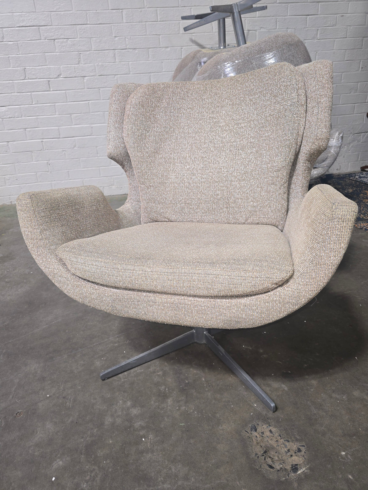 Beige Upholstered Swivel Accent Chair