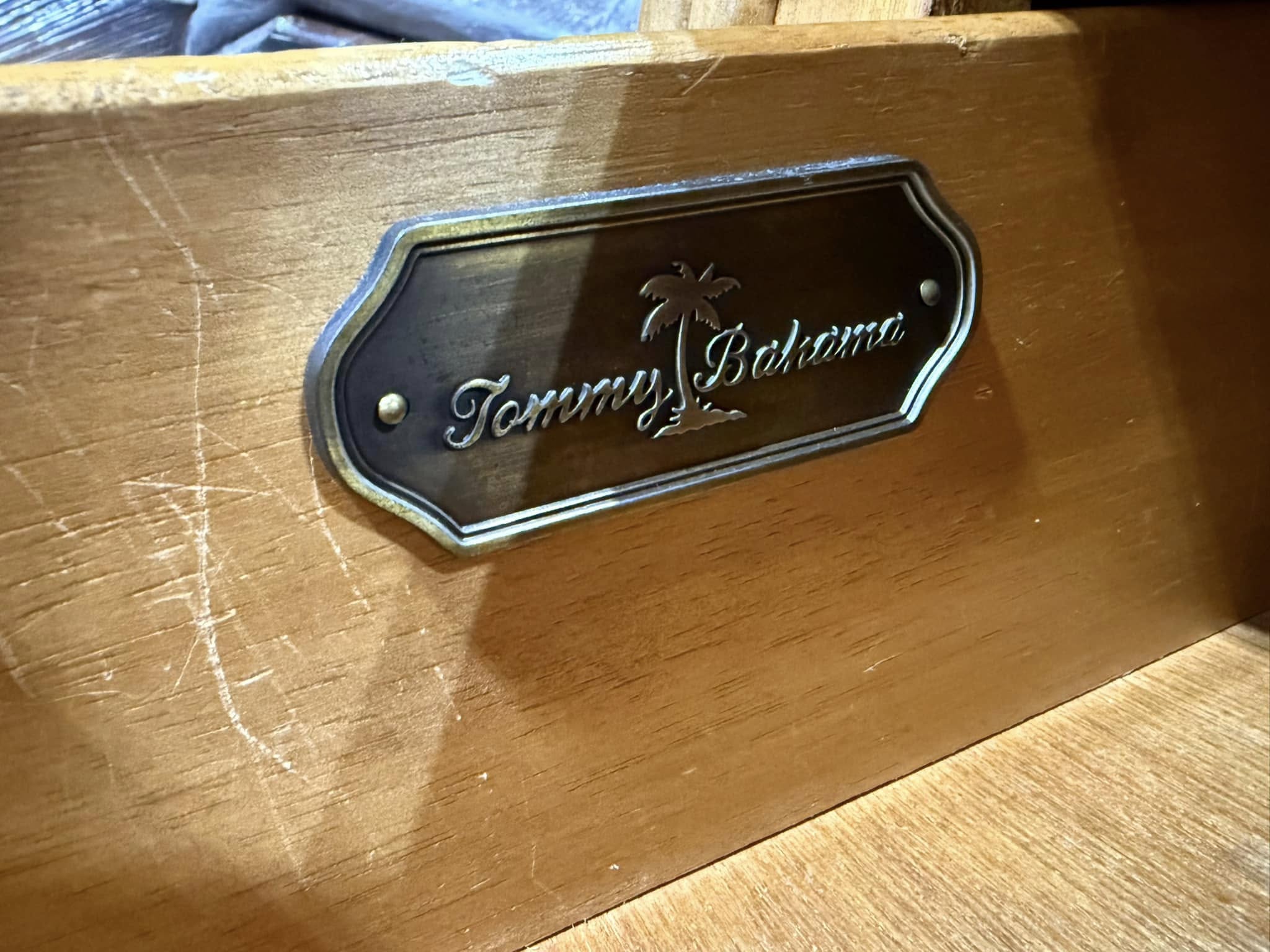 Tommy Bahama three-drawer dresser with drawers open, showcasing interior storage