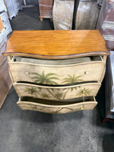 Tommy Bahama three-drawer dresser with drawers open, showcasing interior storage