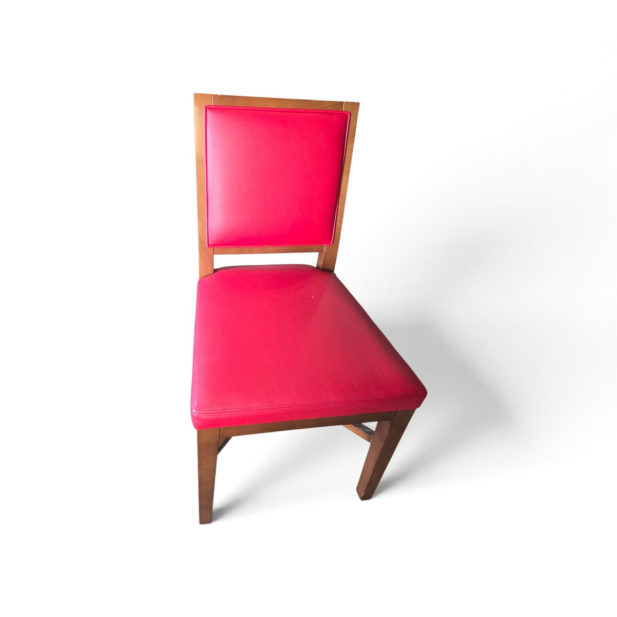 Used red upholstered dining chair with padded seat and backrest and brown wood-finish frame, SHL