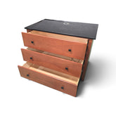 Used 3 drawer dresser with all drawers open showing storage space and black granite top with pre-drilled TV hole from Southern Hospitality Liquidation.
