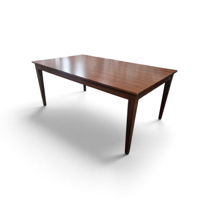 Used SHL 72-inch brown wood dining table with tapered legs.